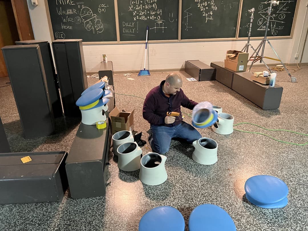 Behind the scenes photo 31 from Clone Cops production showing danny dones assembling clone cops helmets